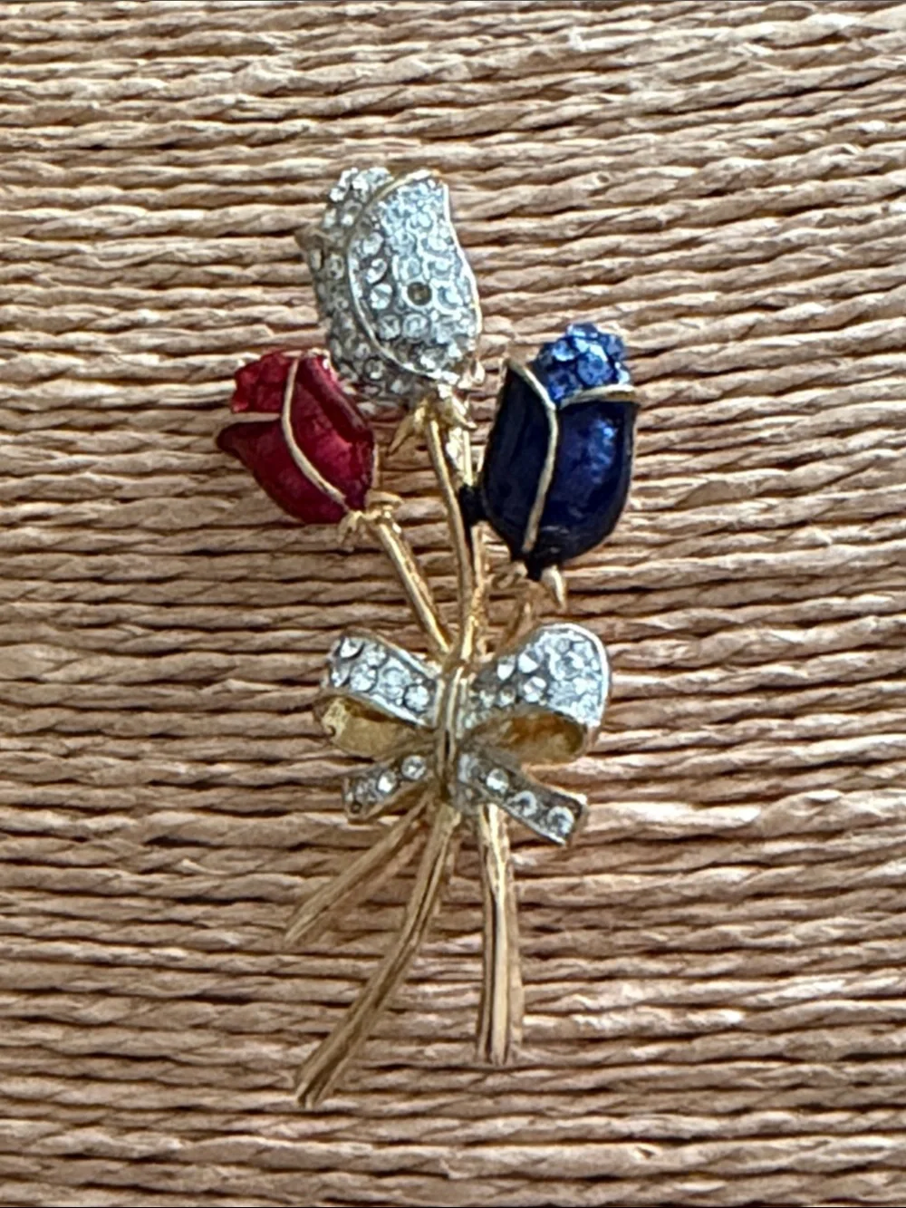 Red white and blue crystal roses bouquet with a pave crystal bow brooch
